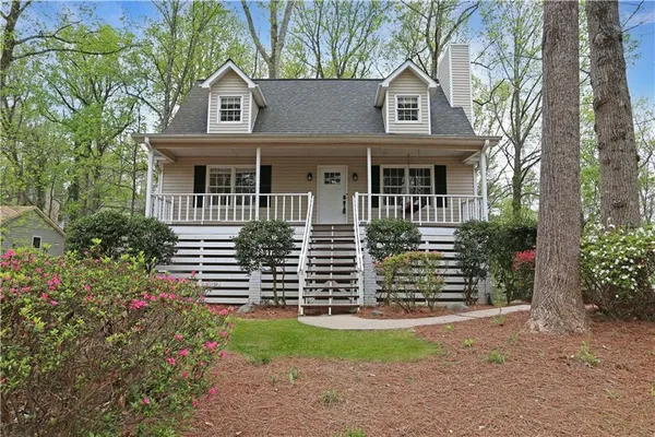 front view of a house with a yard