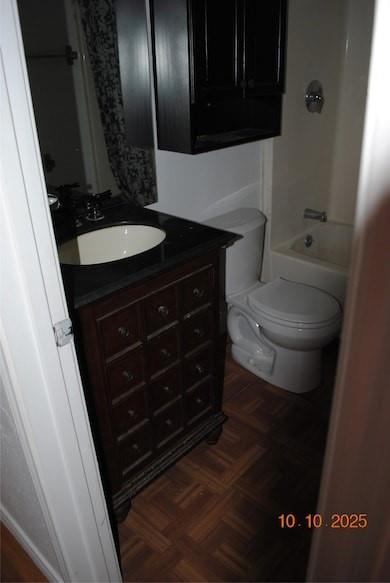 1660 Marsalis Road Lancaster, TX 75146 - Photo 7 of 12 a bathroom with a toilet a sink and mirror