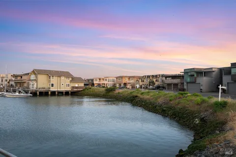 a view of a lake with houses