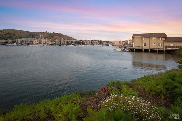 a view of a lake with houses