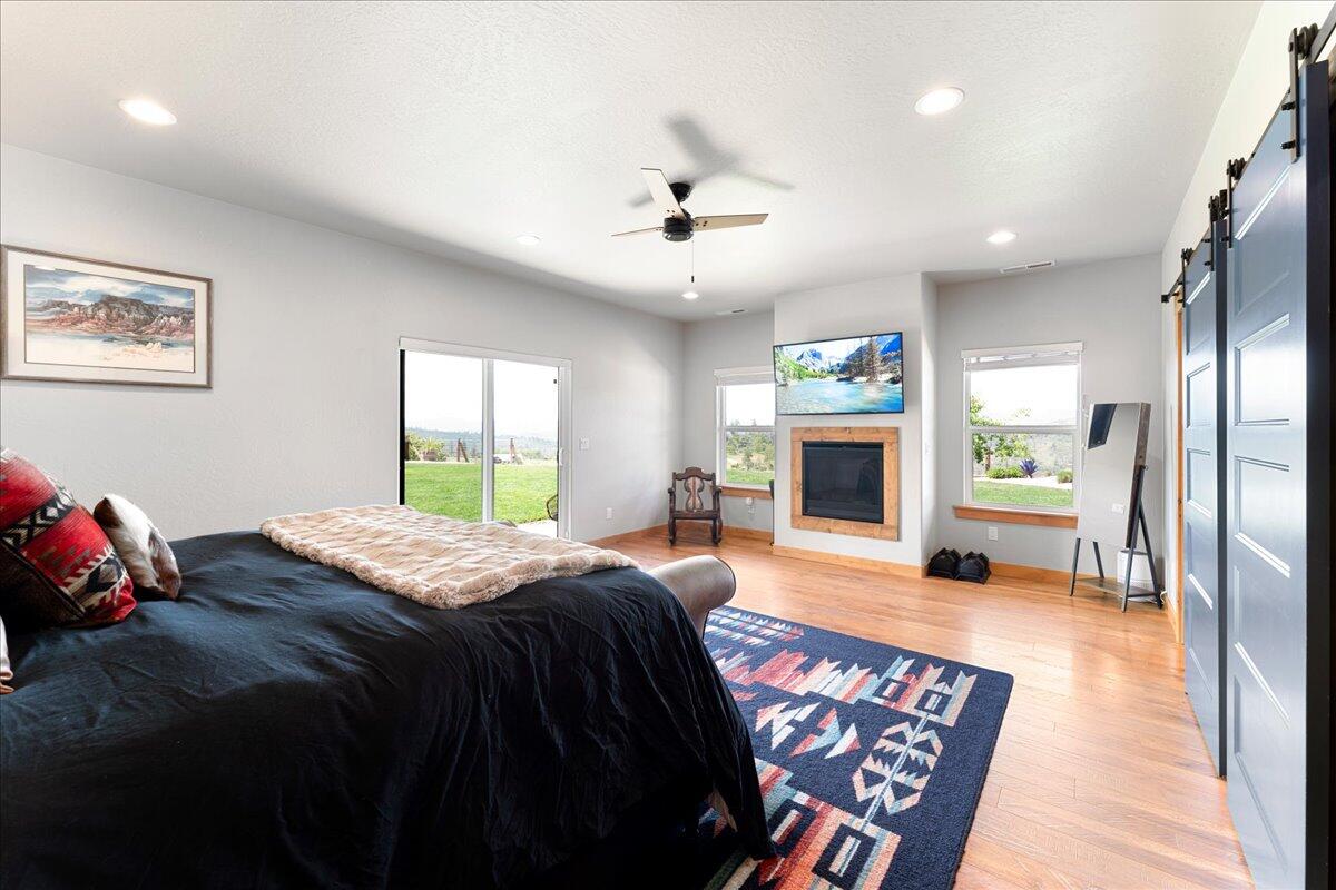 2220 Butte Falls Highway Eagle Point, OR 97524 - Photo 24 of 69 a bedroom with a bed and a couch