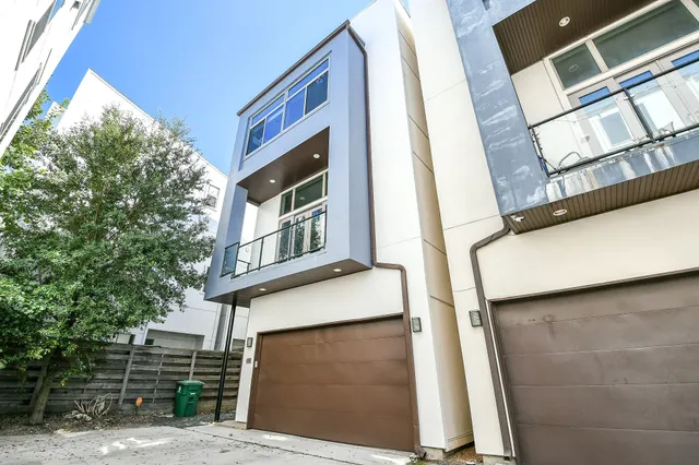 a front view of a house with stairs