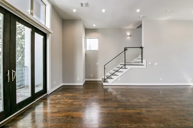 a view of entryway with wooden floor