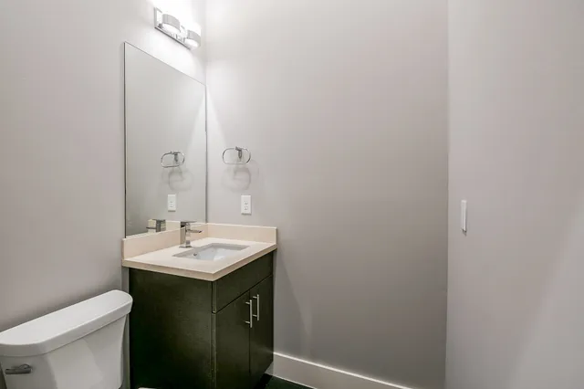 a bathroom with a sink and a toilet