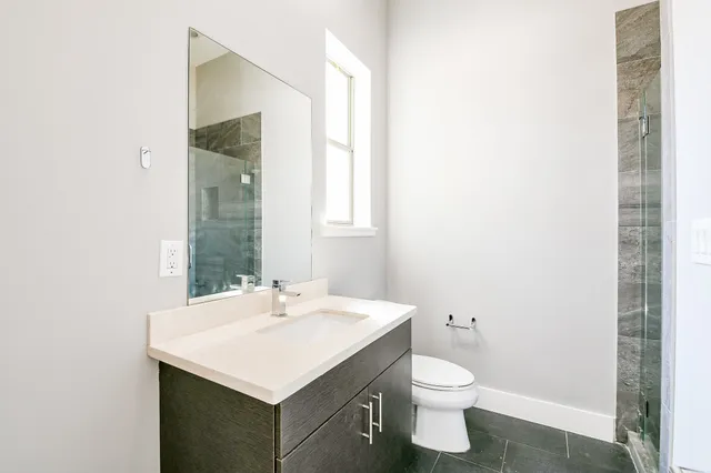 a bathroom with a sink and a toilet