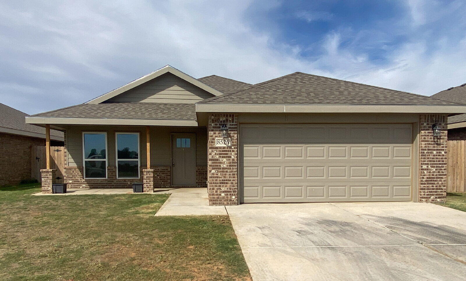 8526 11th Street Lubbock, TX 79416 - Photo 1 of 13 a front view of a house