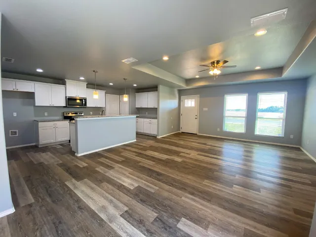 a view of kitchen and windows