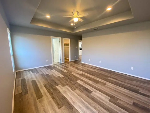a bathroom with a bathtub and a sink