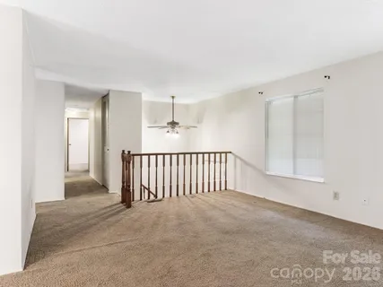 a view of a livingroom with a staircase
