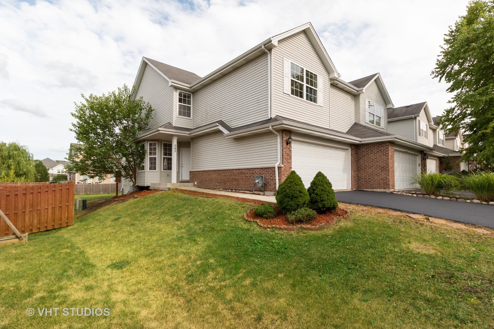545 Maggie Lane Romeoville, IL 60446 - Photo 1 of 23 front view of a house with a yard