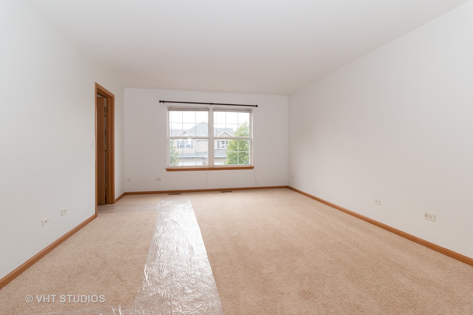 545 Maggie Lane Romeoville, IL 60446 - Photo 12 of 23 an empty room with a window