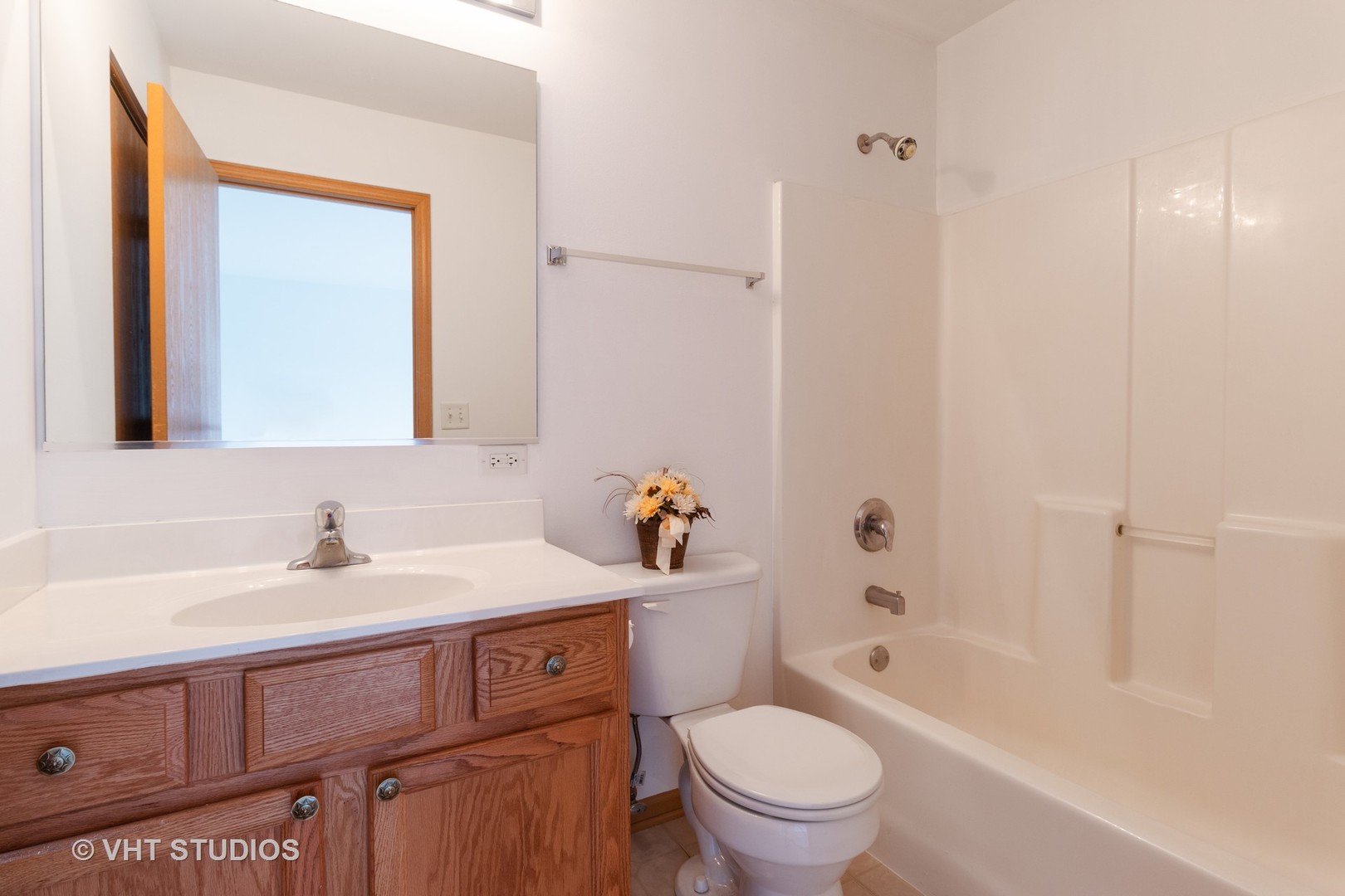545 Maggie Lane Romeoville, IL 60446 - Photo 14 of 23 a bathroom with a sink toilet and shower