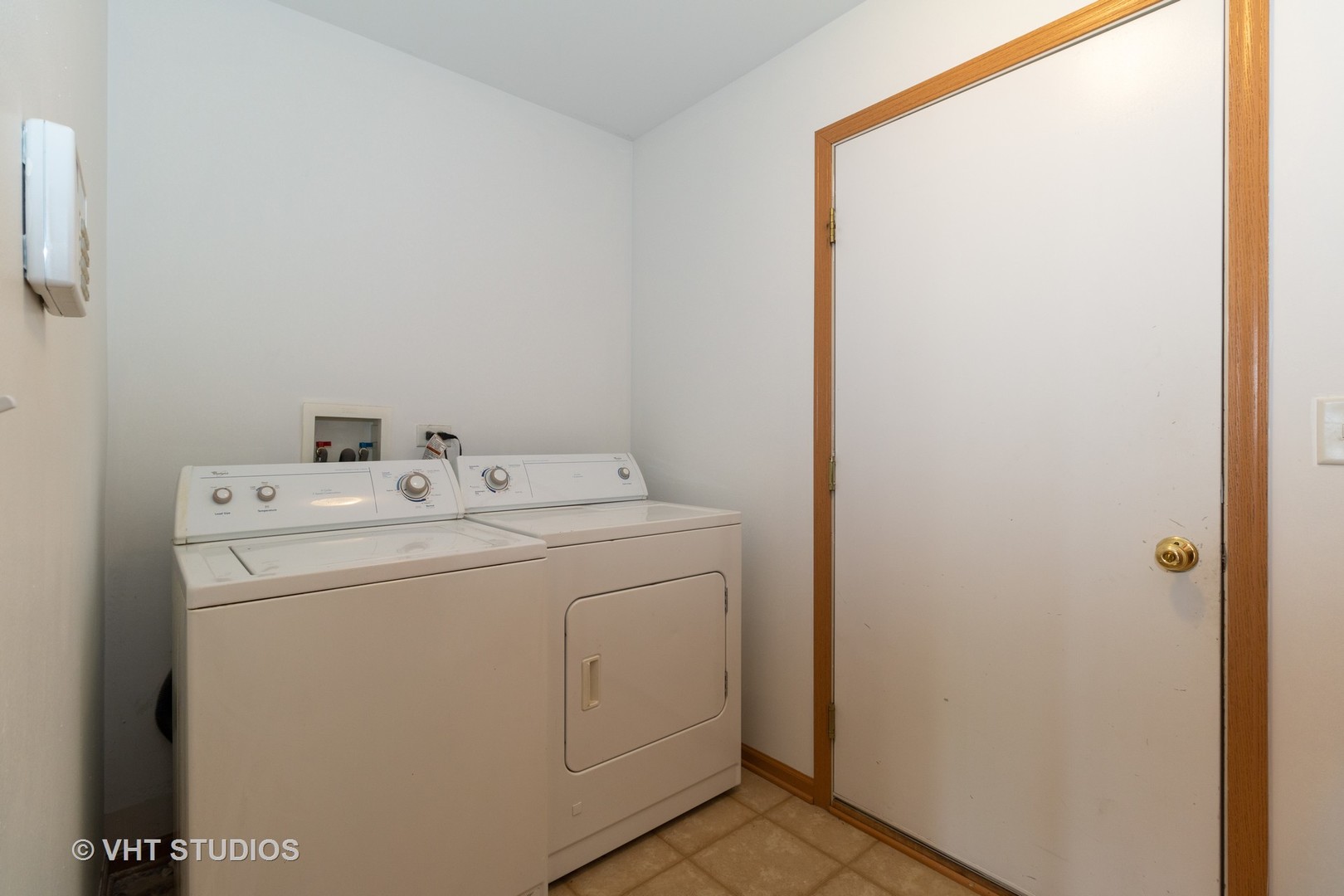 545 Maggie Lane Romeoville, IL 60446 - Photo 18 of 23 a utility room with dryer and washer