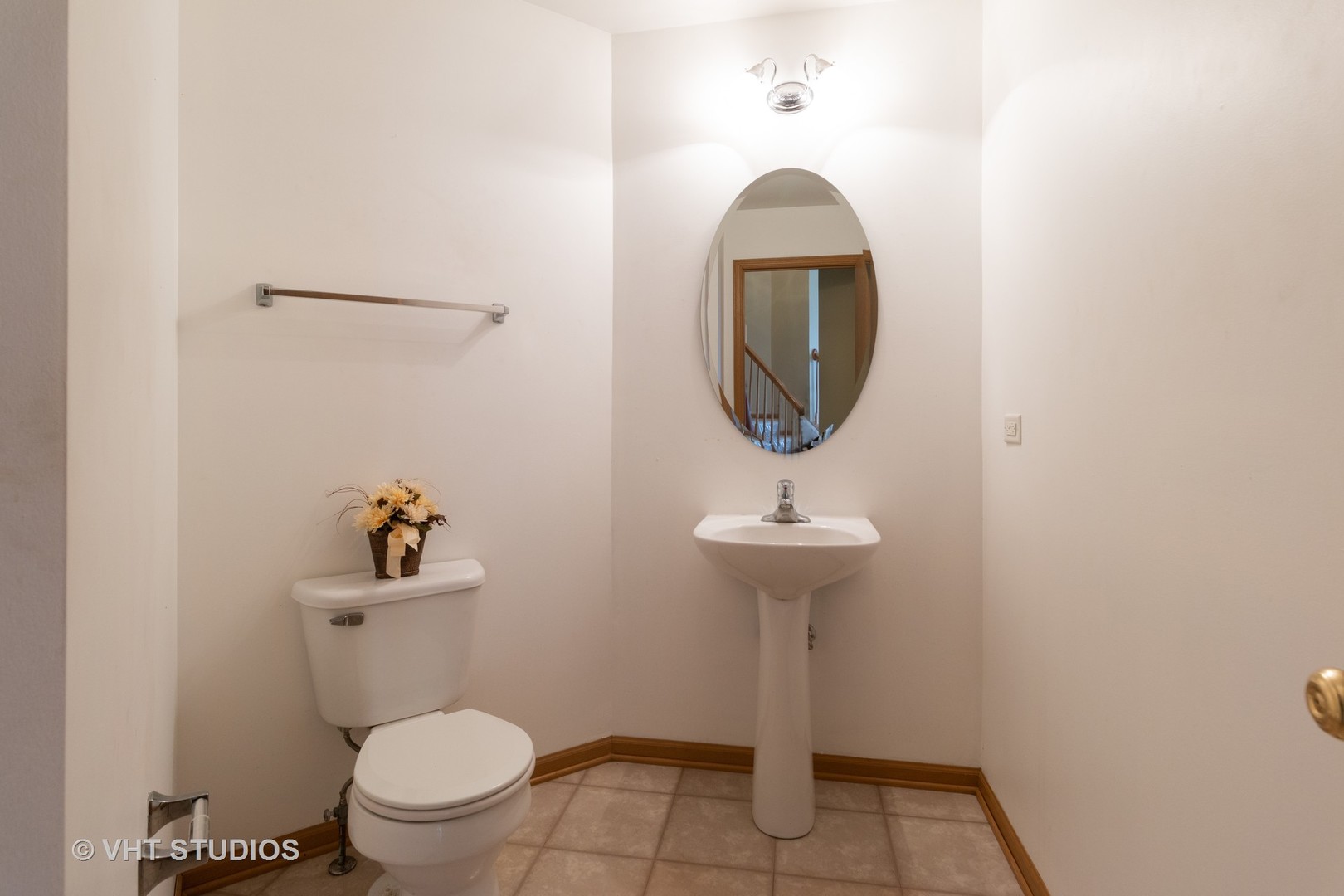 545 Maggie Lane Romeoville, IL 60446 - Photo 19 of 23 a bathroom with a sink toilet and a mirror