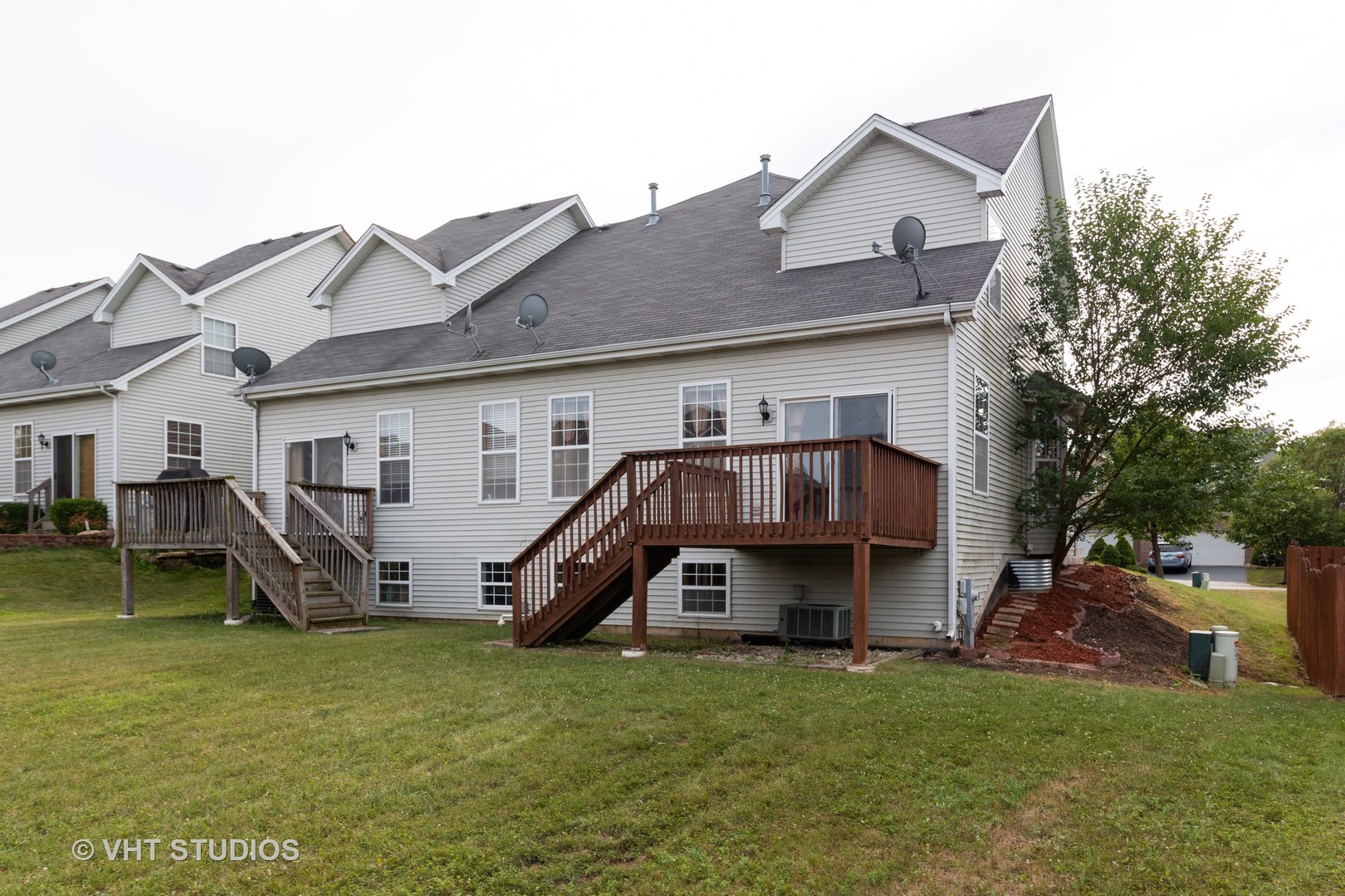 545 Maggie Lane Romeoville, IL 60446 - Photo 22 of 23 a view of a house with a yard and sitting area
