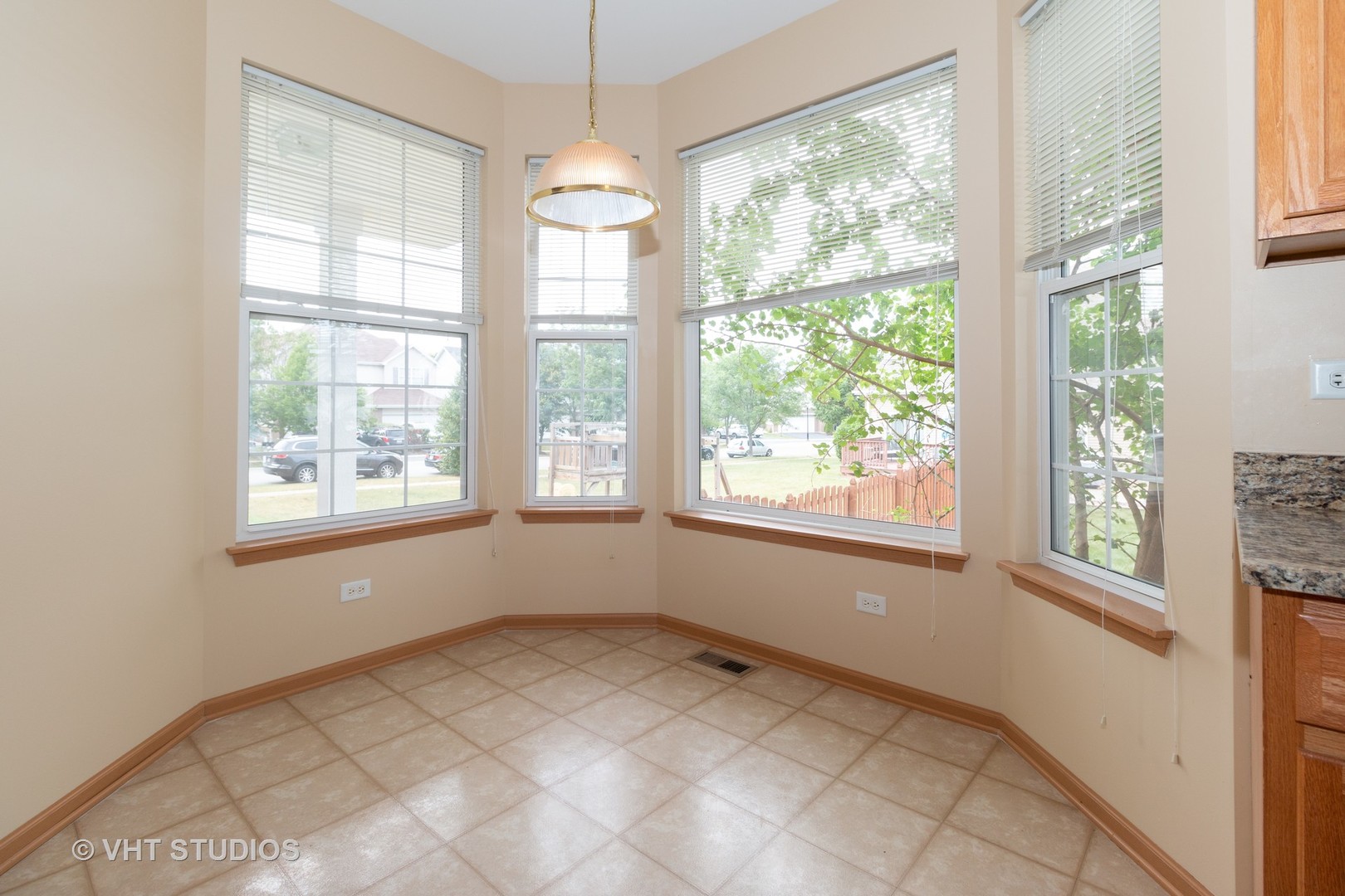545 Maggie Lane Romeoville, IL 60446 - Photo 9 of 23 a view of an empty room with a window