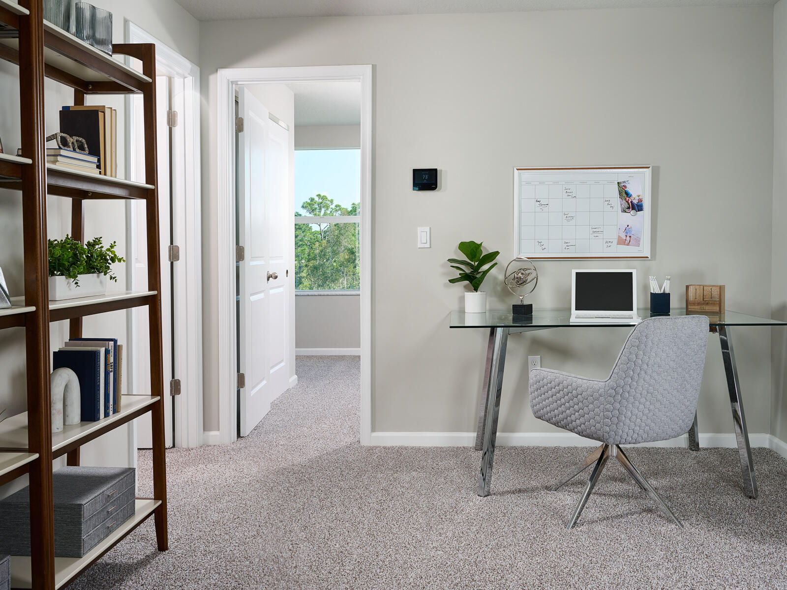 5788 Southeast Edgewater Circle Stuart, FL 34997 - Photo 6 of 9 a workspace with furniture window and a fireplace