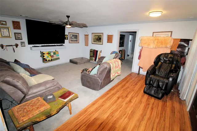 a bathroom with a sink a toilet a tub and shower