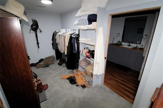 a view of a balcony with lake view and a floor to ceiling window