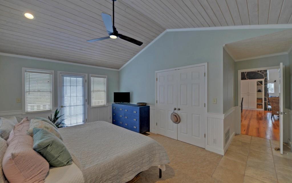 1431 Tame Turkey Road Lakemont, GA 30552 - Photo 14 of 62 a bedroom with a bed and a television