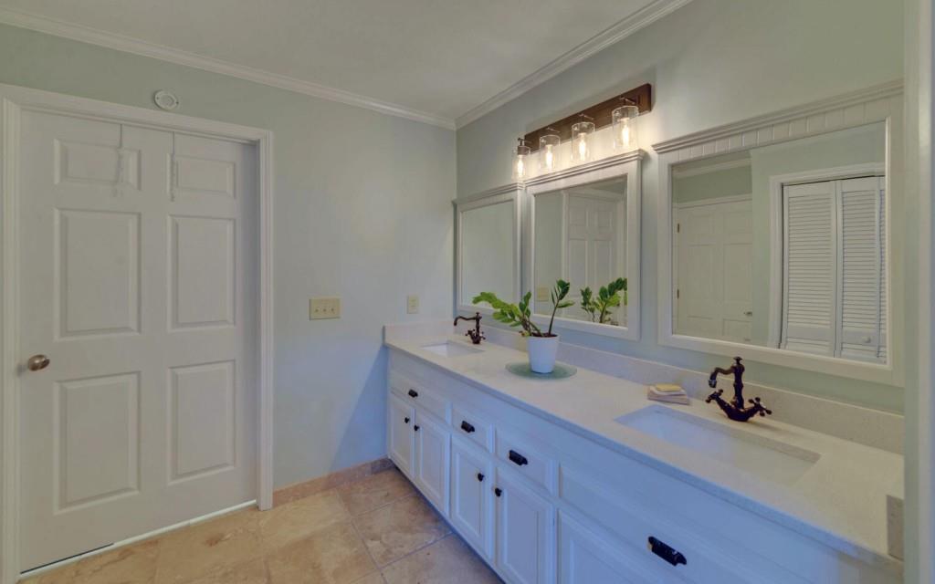 1431 Tame Turkey Road Lakemont, GA 30552 - Photo 17 of 62 a bathroom with a sink and a mirror
