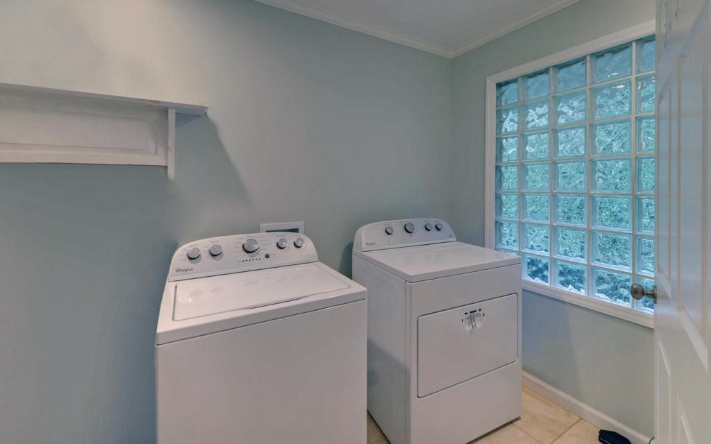 1431 Tame Turkey Road Lakemont, GA 30552 - Photo 21 of 62 a utility room with dryer and washer