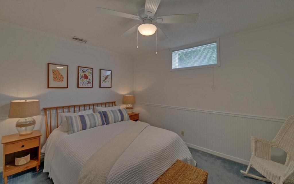 1431 Tame Turkey Road Lakemont, GA 30552 - Photo 30 of 62 a bedroom with a bed and a window