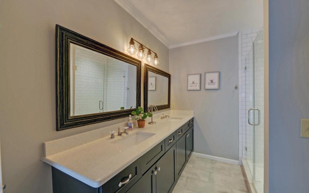 1431 Tame Turkey Road Lakemont, GA 30552 - Photo 32 of 62 a bathroom with a sink and a mirror