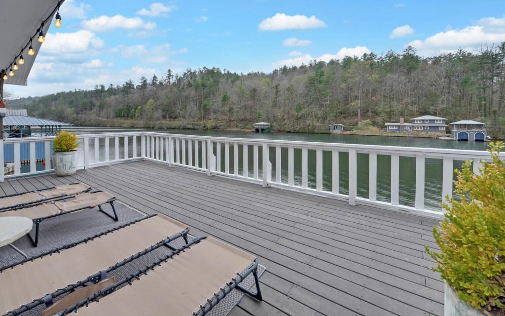 1431 Tame Turkey Road Lakemont, GA 30552 - Photo 47 of 62 a view of a balcony with wooden floor and fence