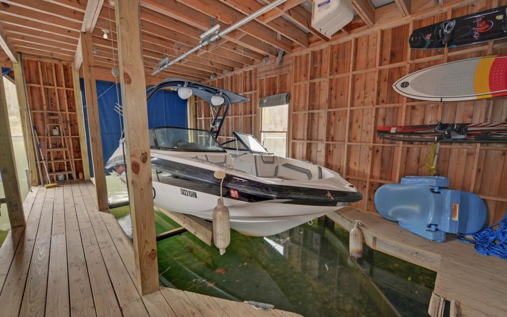 1431 Tame Turkey Road Lakemont, GA 30552 - Photo 50 of 62 a view of roof deck with chair and wooden floor