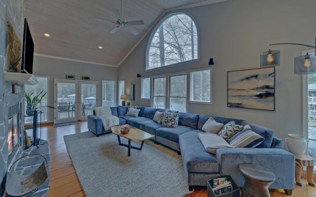 1431 Tame Turkey Road Lakemont, GA 30552 - Photo 5 of 62 a living room with furniture and a flat screen tv