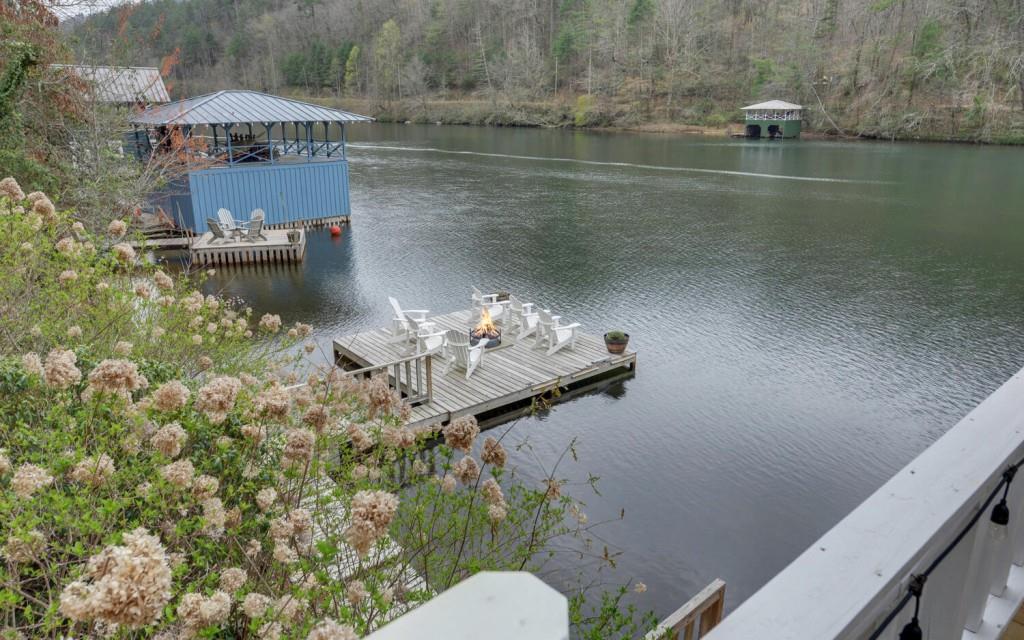 1431 Tame Turkey Road Lakemont, GA 30552 - Photo 53 of 62 a view of a lake with a mountain in the background