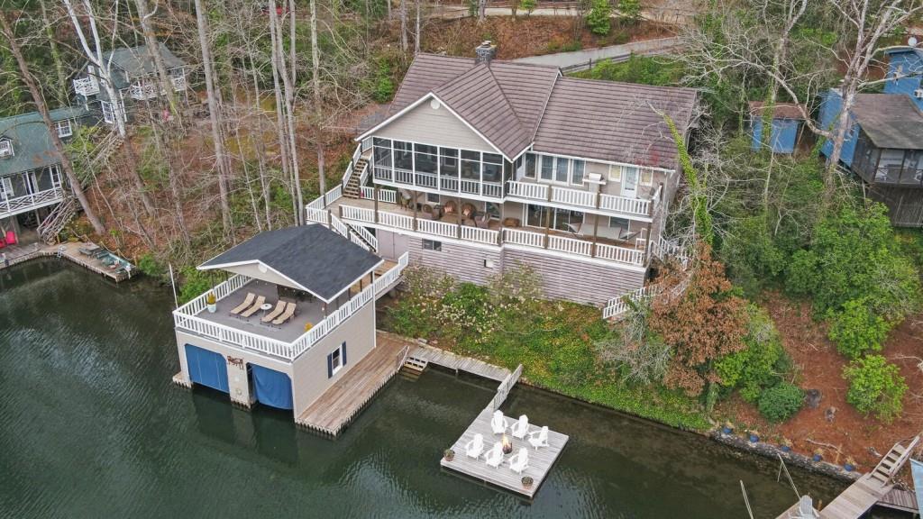 1431 Tame Turkey Road Lakemont, GA 30552 - Photo 57 of 62 an aerial view of a house with a yard and balcony