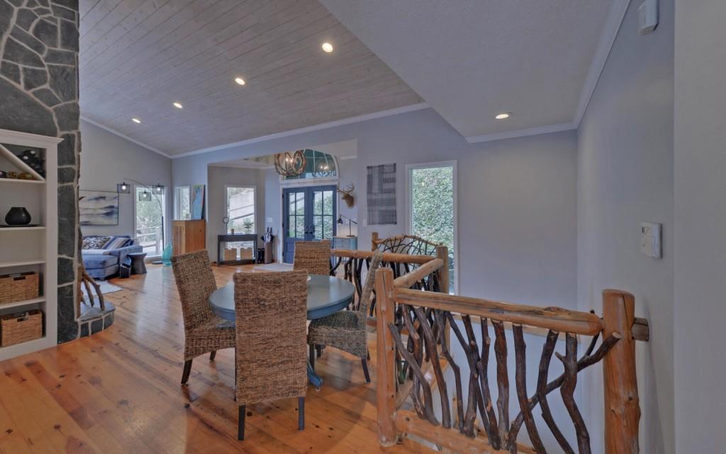 1431 Tame Turkey Road Lakemont, GA 30552 - Photo 8 of 62 a view of a dining room with furniture window and wooden floor