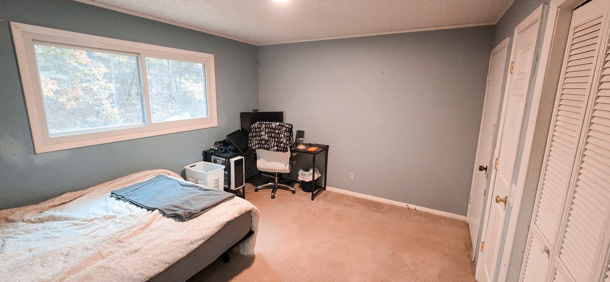 936 Ridge Road Quebeck, TN 38579 - Photo 23 of 32 a bedroom with a bed and a window