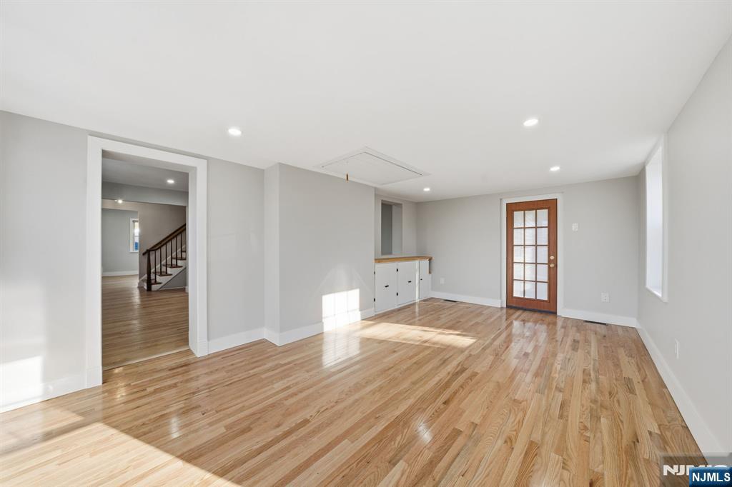 25 Forest Street Closter, NJ 07624 - Photo 18 of 48 a view of an empty room and wooden floor