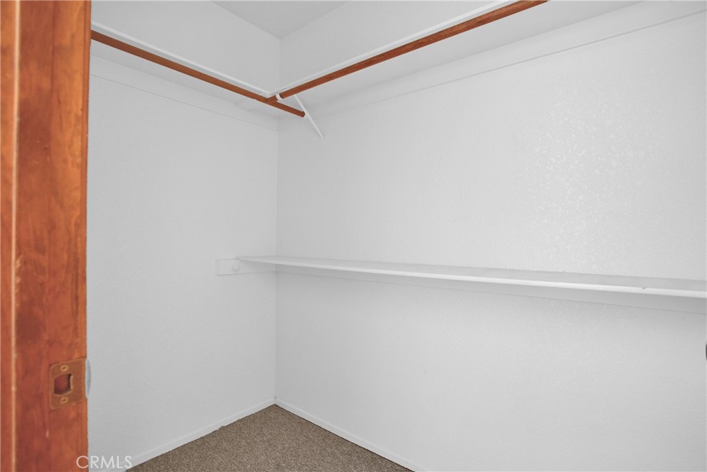 22544 Ojai Road Apple Valley, CA 92308 - Photo 9 of 20 a view of an empty walk in closet