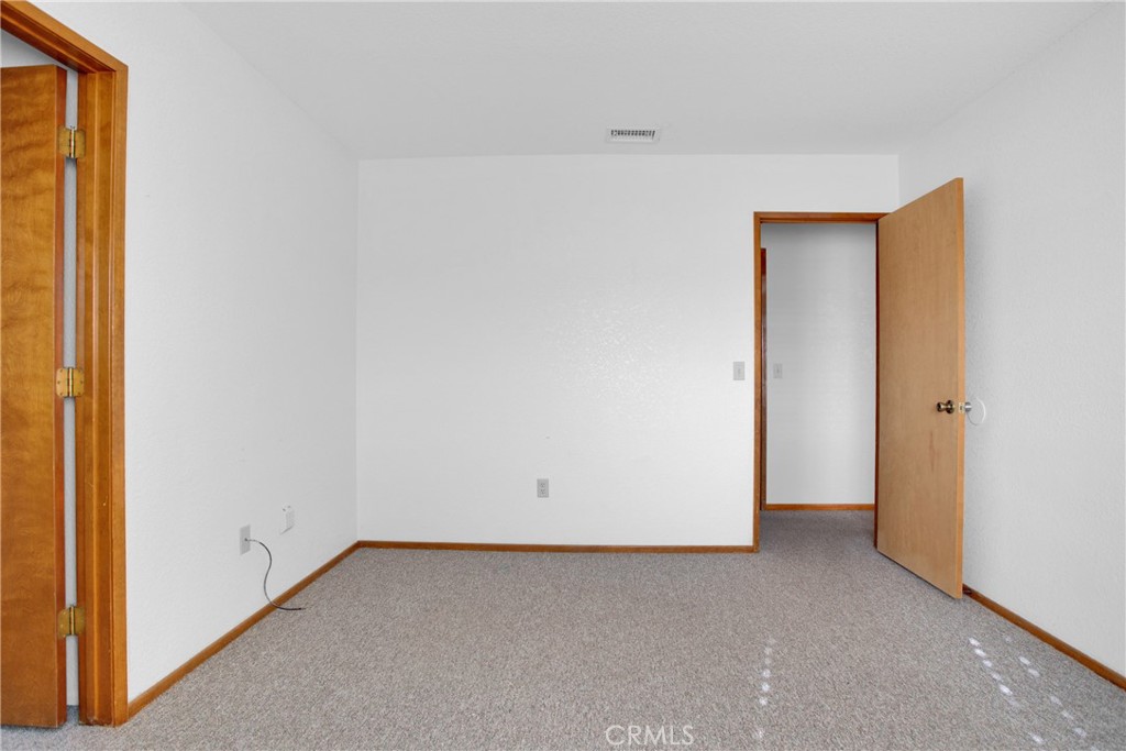 22544 Ojai Road Apple Valley, CA 92308 - Photo 10 of 20 a view of an empty room