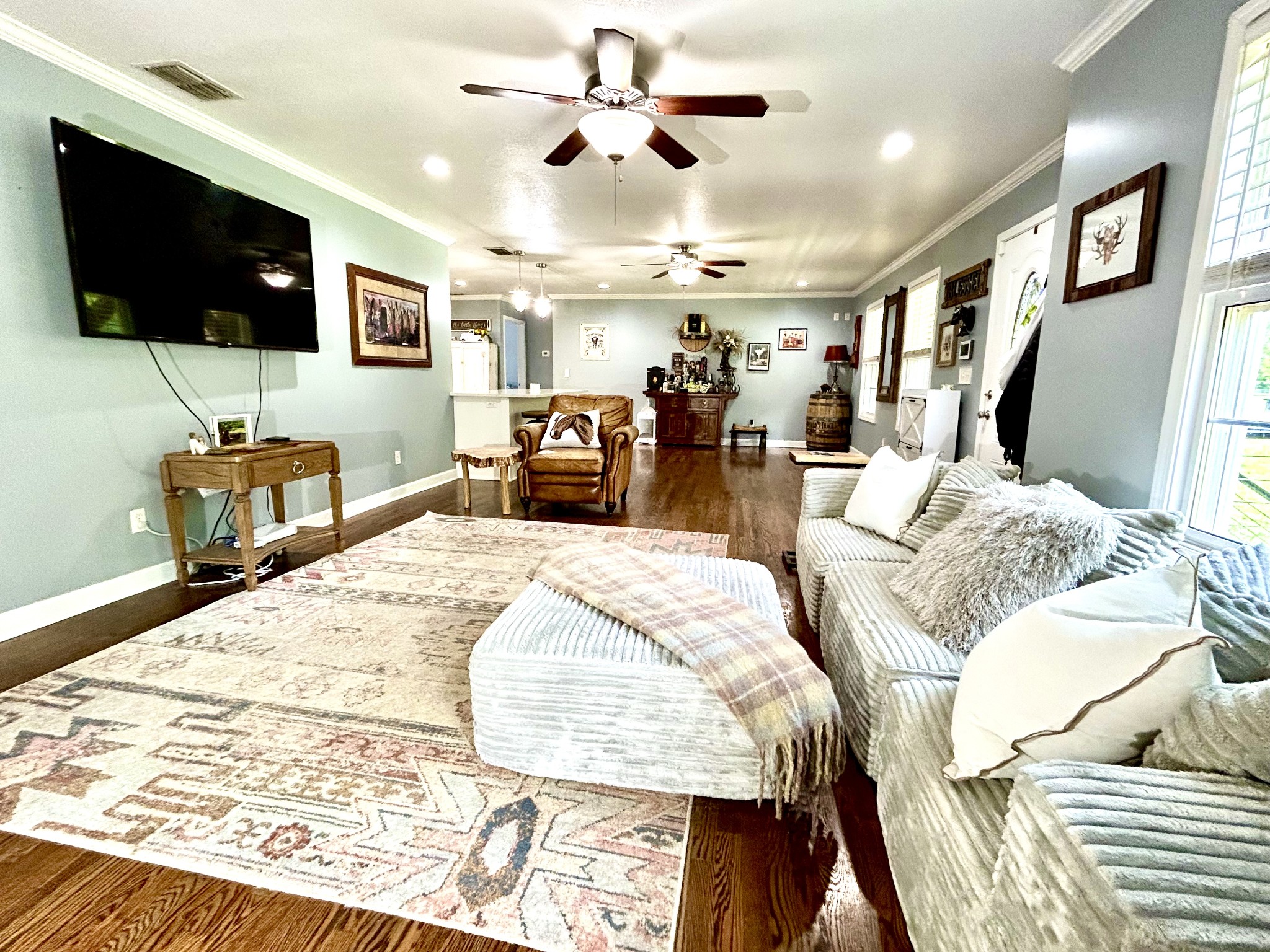1198 Ed Sanders Road Lynchburg, TN 37352 - Photo 6 of 36 a bed room with a bed a television and a large window