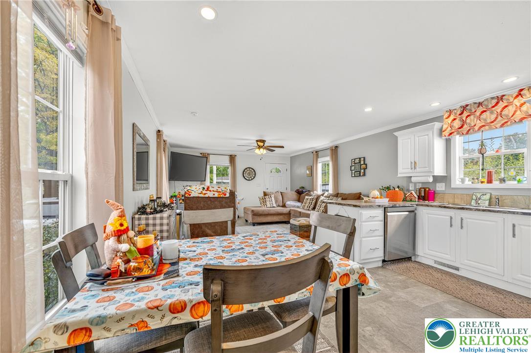 8792 Turkey Ridge Road Breinigsville, PA 18031 - Photo 13 of 33 a view of a dining room with furniture window and wooden floor