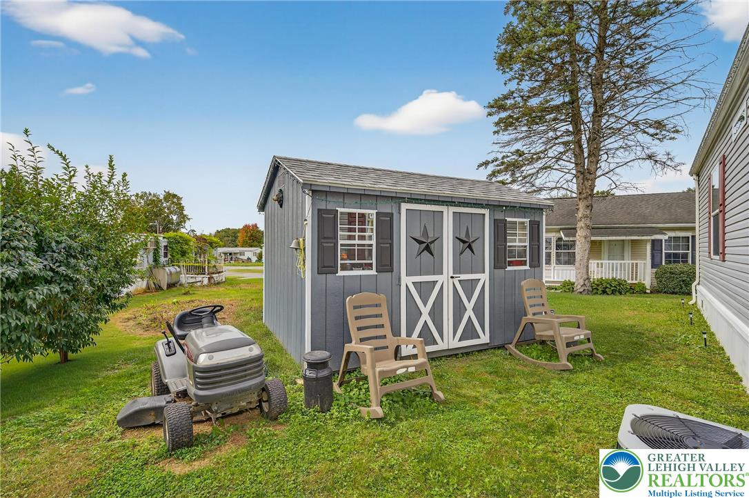 8792 Turkey Ridge Road Breinigsville, PA 18031 - Photo 25 of 33 a front view of a house with garden