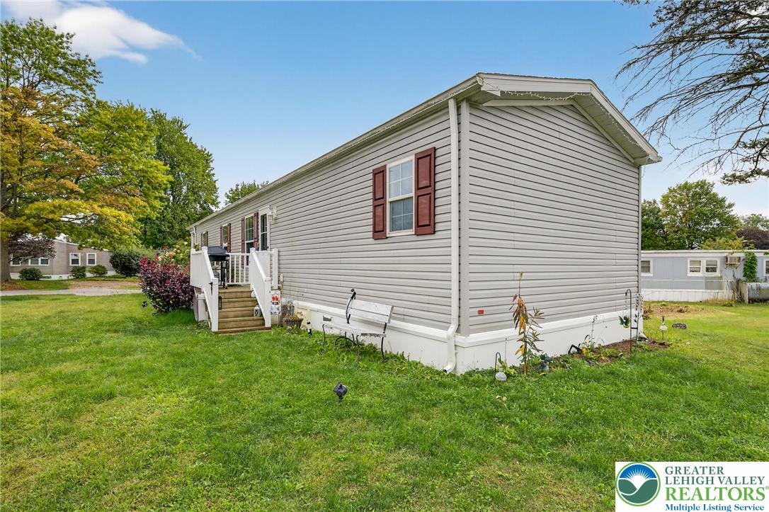8792 Turkey Ridge Road Breinigsville, PA 18031 - Photo 26 of 33 a front view of house with yard and green space