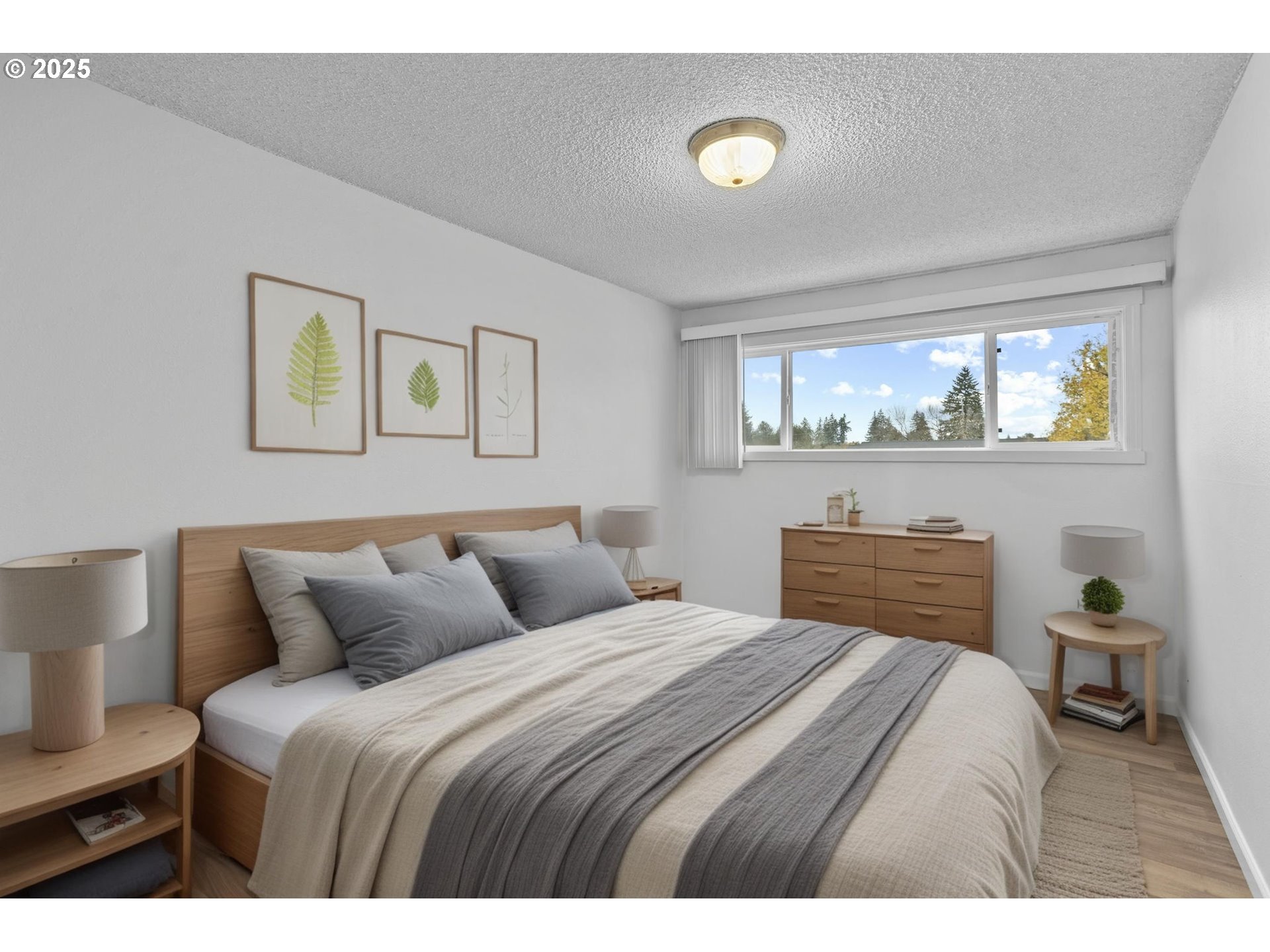 311 Northeast 85th Street, Unit R Vancouver, WA 98665 - Photo 22 of 34 a bedroom with a bed and a window