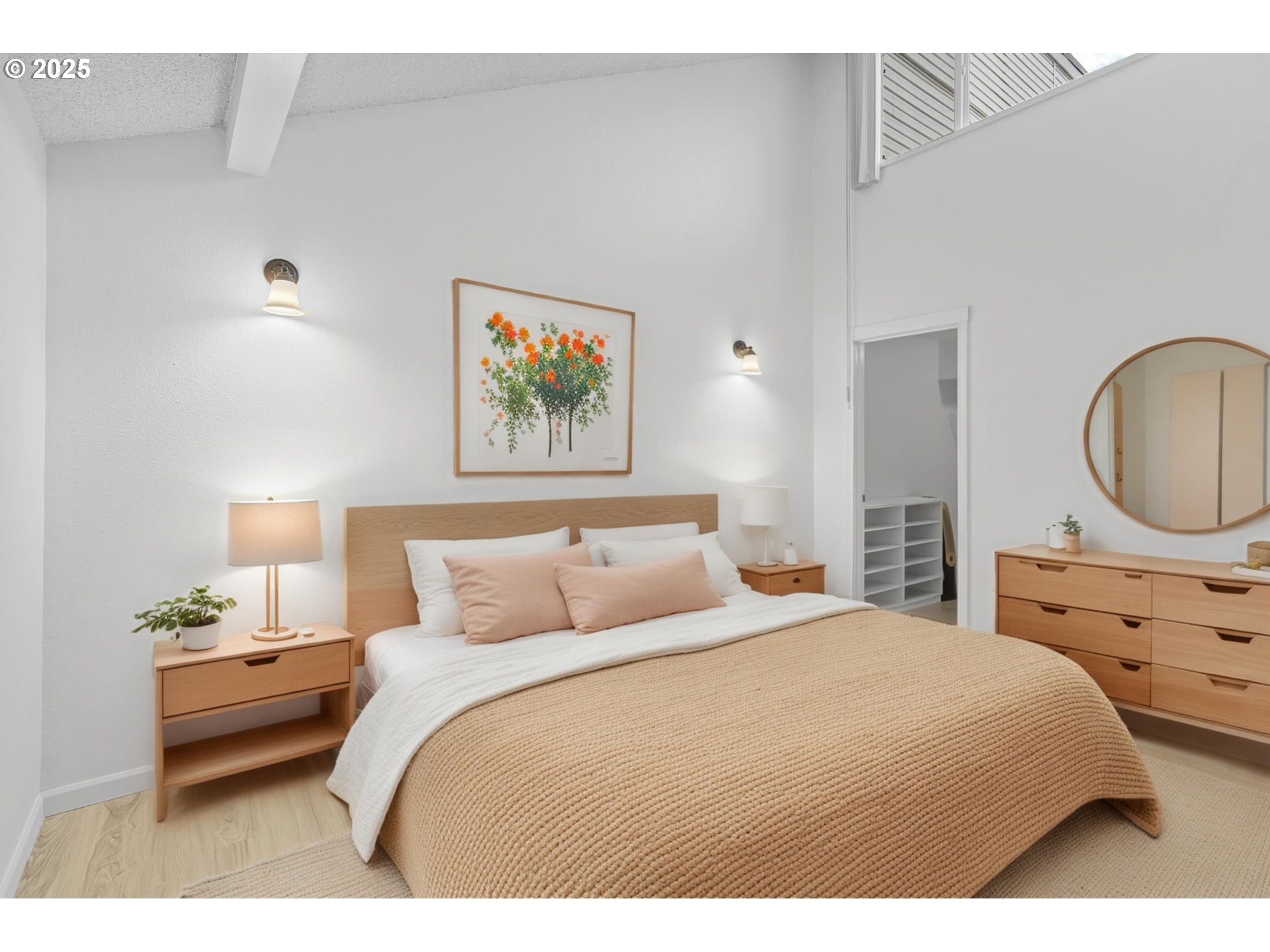 311 Northeast 85th Street, Unit R Vancouver, WA 98665 - Photo 24 of 34 a bedroom with a bed a dresser and painting