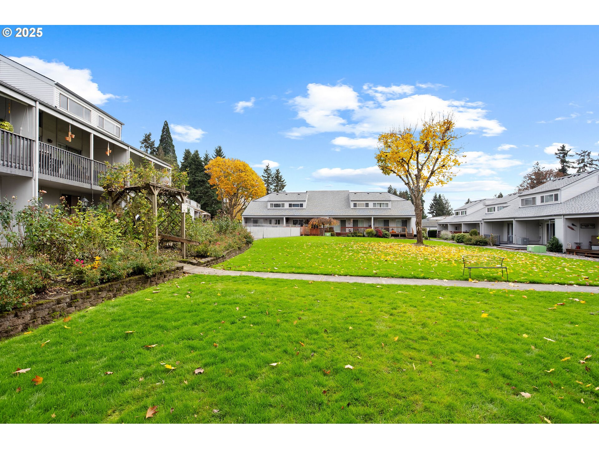 311 Northeast 85th Street, Unit R Vancouver, WA 98665 - Photo 28 of 34 a view of a house with a yard