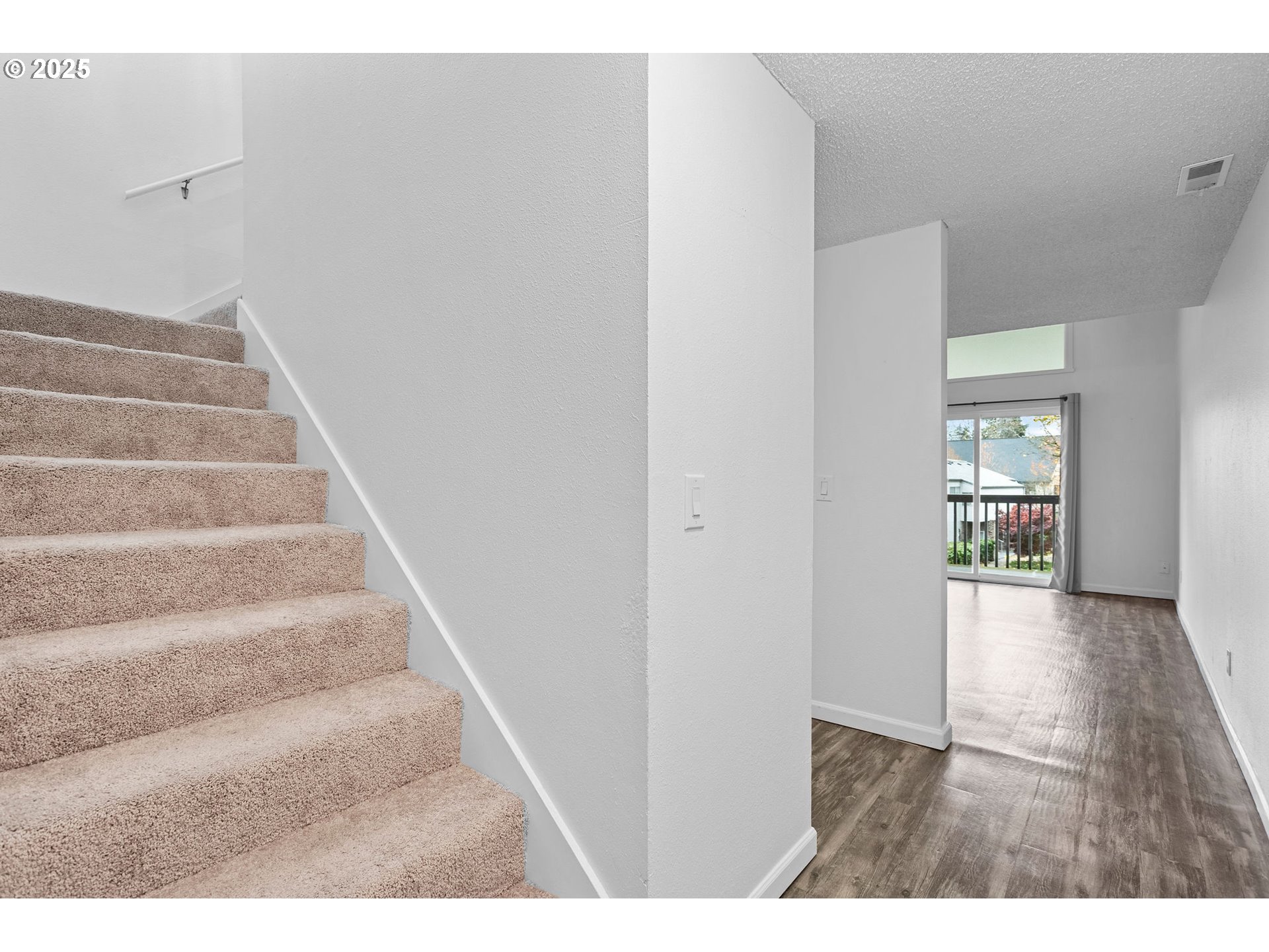 311 Northeast 85th Street, Unit R Vancouver, WA 98665 - Photo 3 of 34 a view of an entryway with wooden floor