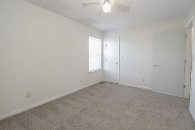 a kitchen with stainless steel appliances granite countertop a refrigerator sink and stove