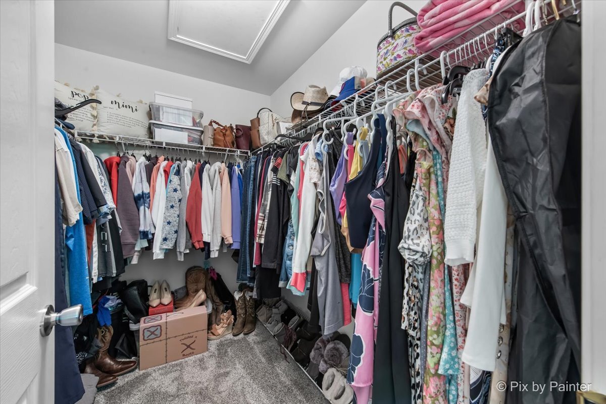 2138 Vanderbilt Drive Geneva, IL 60134 - Photo 10 of 18 a view of walk in closet with clothes