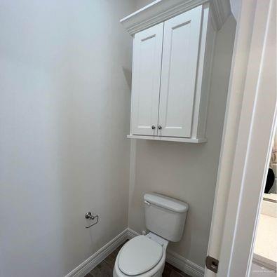 804 Grayson Avenue McAllen, TX 78504 - Photo 22 of 30 a white toilet sitting next to a sink