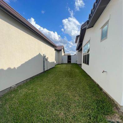 804 Grayson Avenue McAllen, TX 78504 - Photo 28 of 30 a backyard of a house with lots of green space